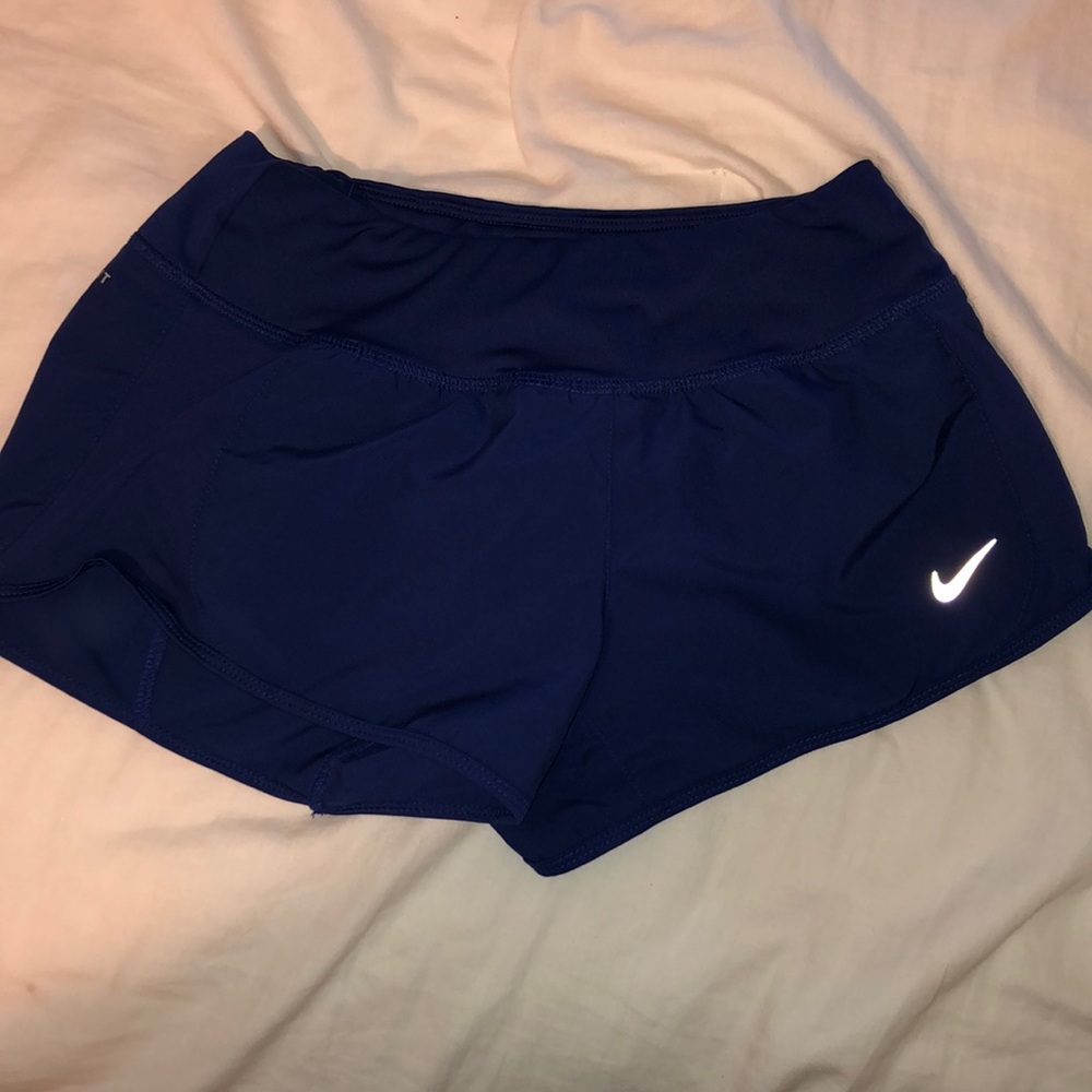 Blue Dry-Fit Nike running shorts
